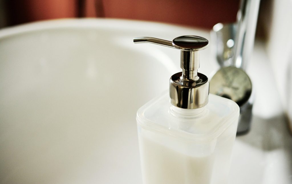 clean sparkling white toilet bowl after cleaning, bright bathroom