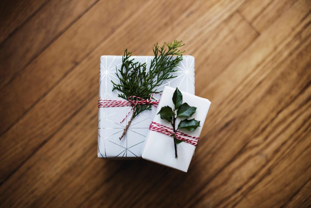 gift box with home insulation products on wooden floor