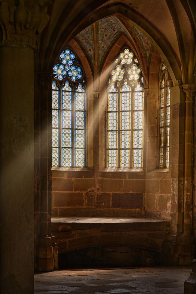dirty window glass with water stains in sunlight