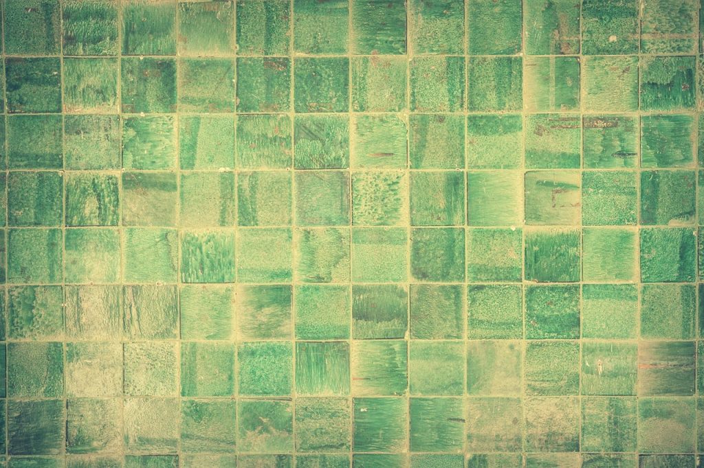 grout sealing pen applied on bathroom floor tile