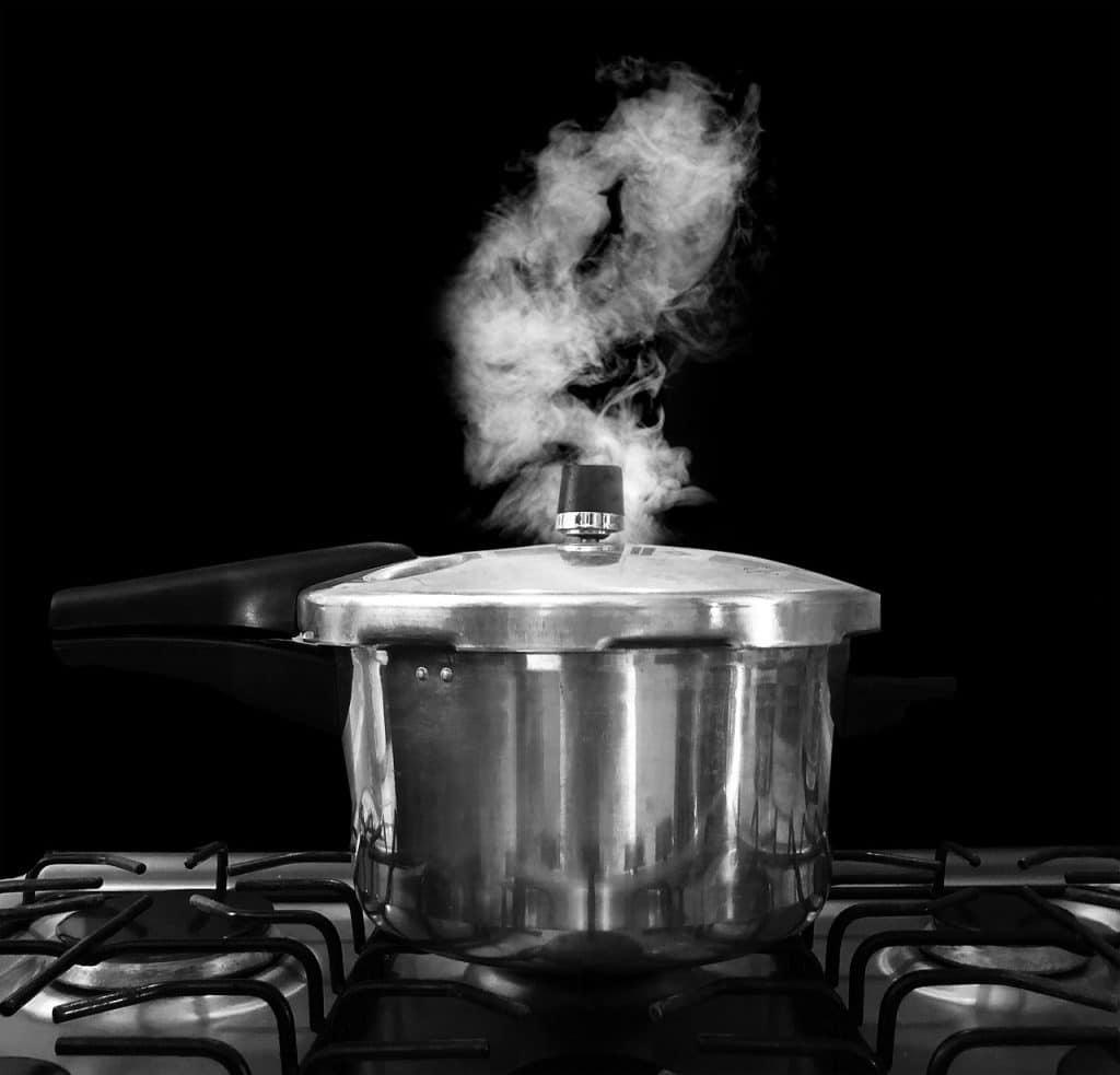 worn out rice cooker inner pot with peeling non-stick coating