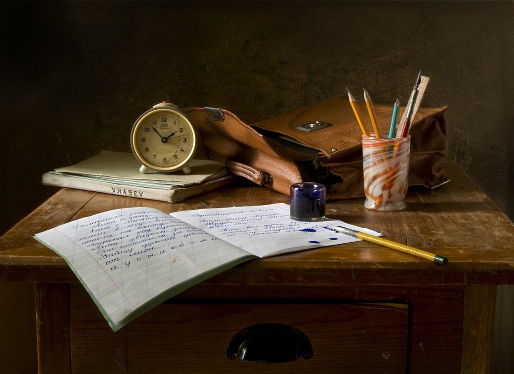 checklist form with pen on wooden desk