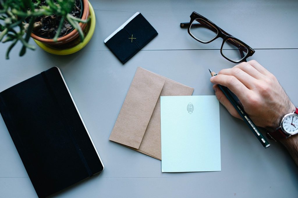 business documents and electricity bill spread on table