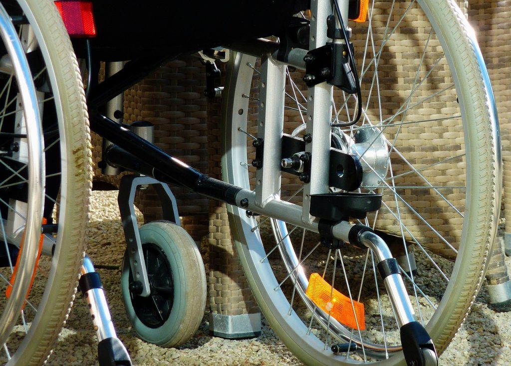 disabled person receiving daily living assistance at home