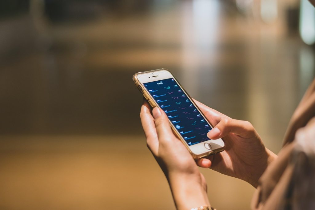 bank app on smartphone showing monthly government childcare payment deposit